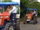 MS Dhoni does something different by driving tractor during lockdown MS Dhoni driving a tractor during the lockdown